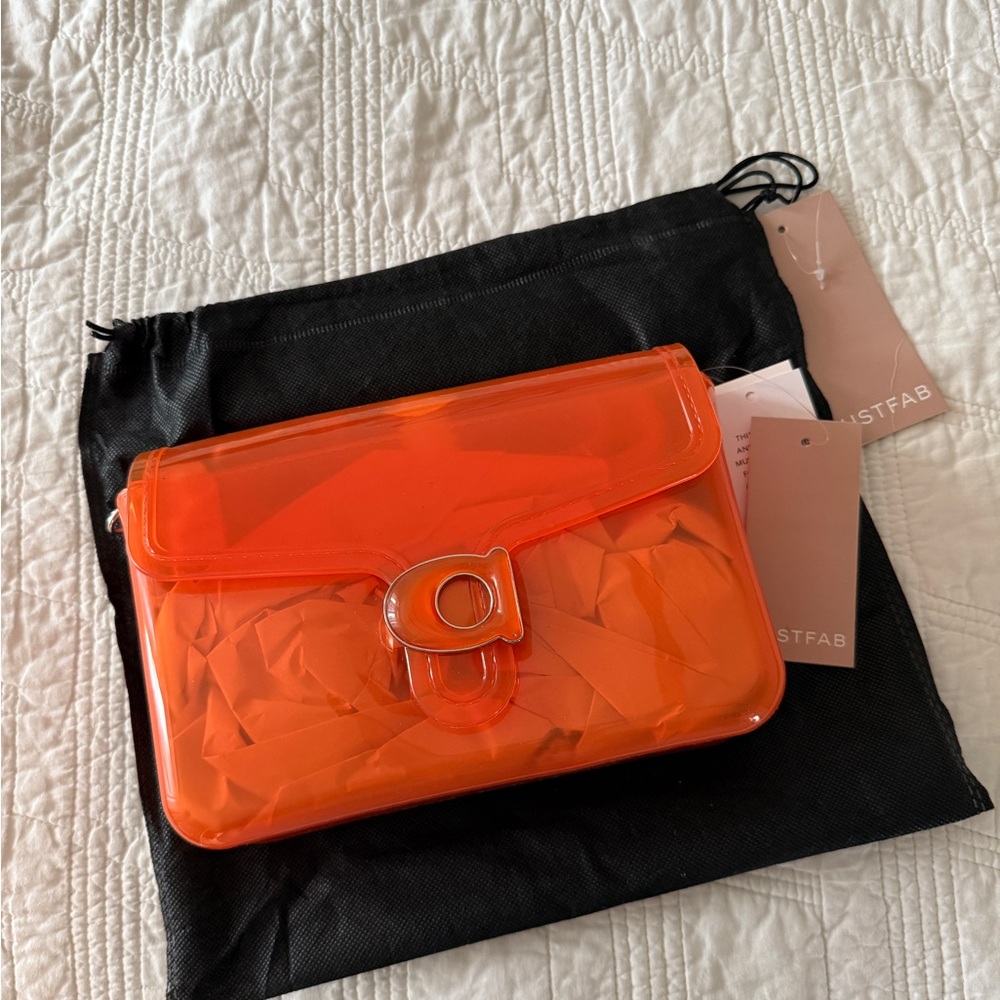 JustFab Vibrant Orange Transparent Clutch